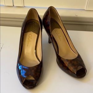 Cole Haan tortoise peep toe pumps
